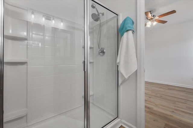 4312 Four Oaks Blvd, Tallahassee, FL 32311 - full bath with a ceiling fan, a shower stall, and wood finished floors