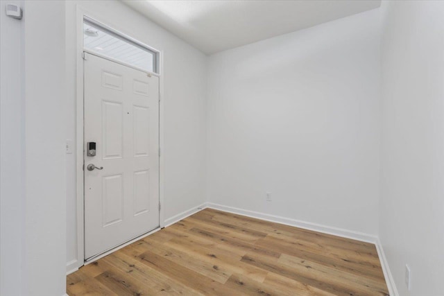 4312 Four Oaks Blvd, Tallahassee, FL 32311 - entryway with light wood-type flooring and baseboards