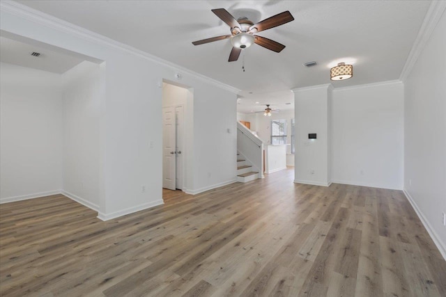 4312 Four Oaks Blvd, Tallahassee, FL 32311 - unfurnished living room featuring a ceiling fan, stairway, light wood-type flooring, and crown molding