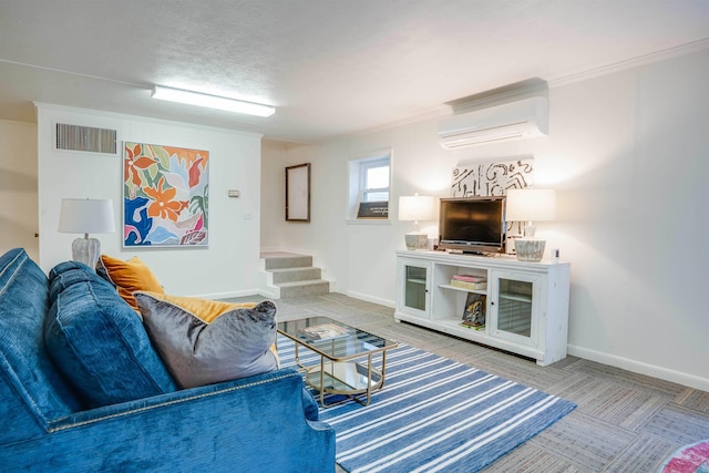 living room featuring crown molding, a textured ceiling, and a wall mounted AC