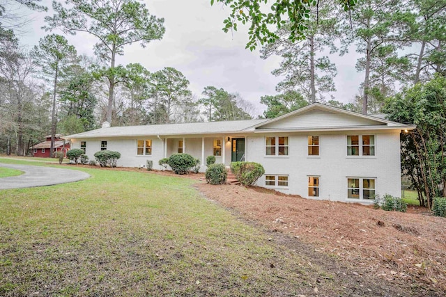 view of front of home with a front yard