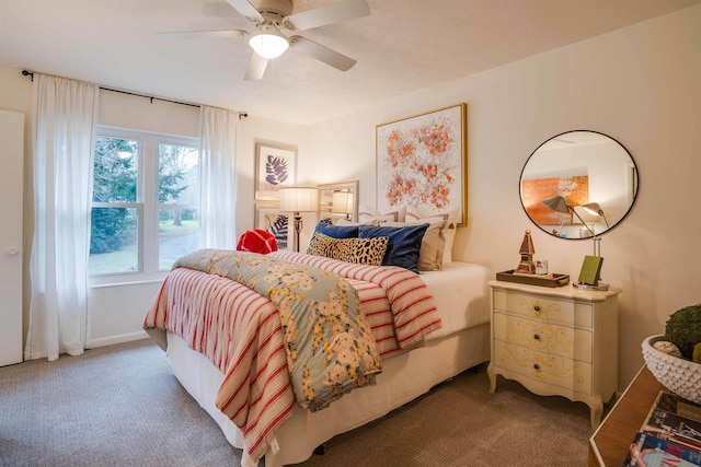 bedroom featuring ceiling fan and carpet floors