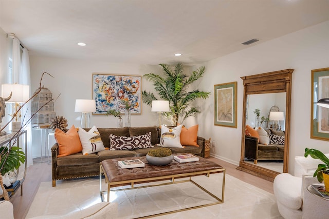 living room with light hardwood / wood-style floors