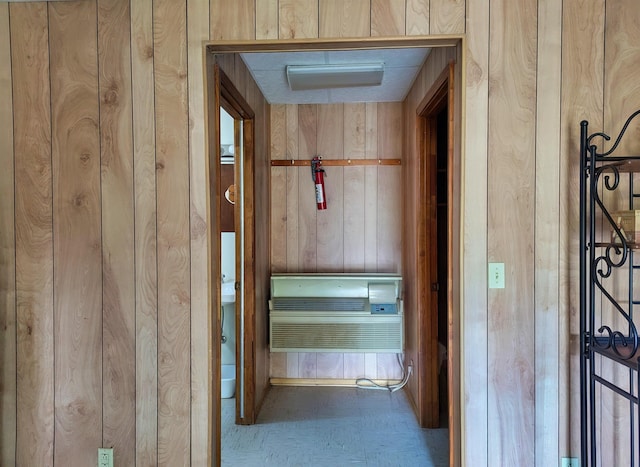 interior space featuring wood walls