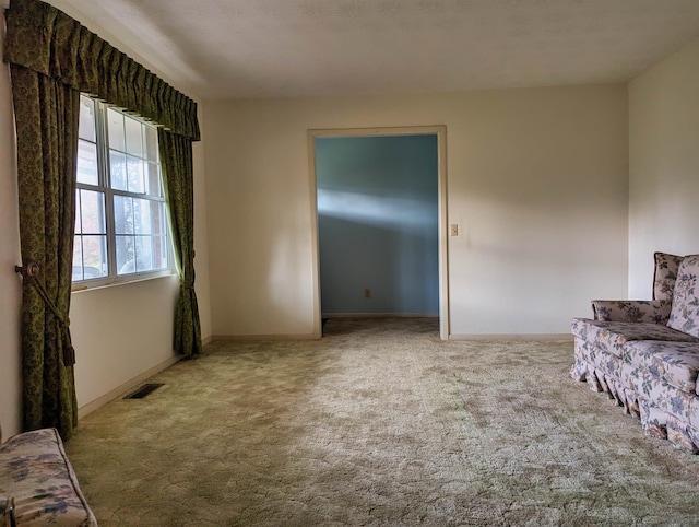 unfurnished room with carpet