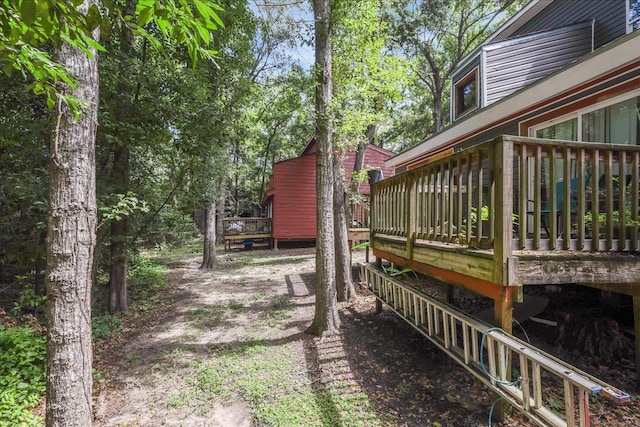 1286 Rumba Ln -, Unit Tallahassee, FL 32304 - view of yard featuring a wooden deck