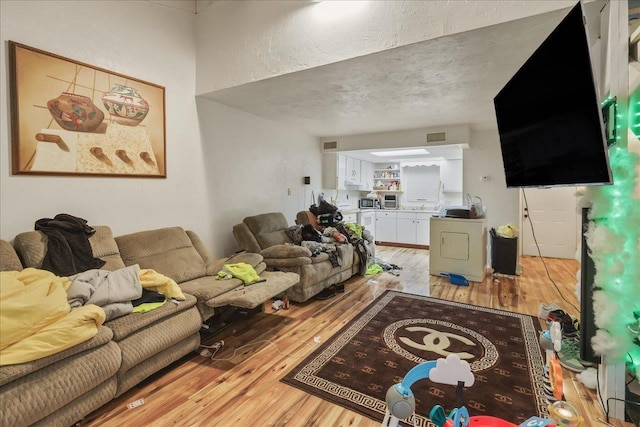 1286 Rumba Ln -, Unit Tallahassee, FL 32304 - living room with light wood-style flooring