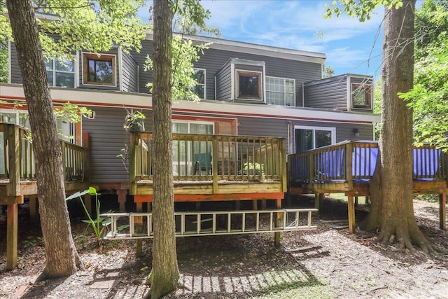 1286 Rumba Ln -, Unit Tallahassee, FL 32304 - back of house with a wooden deck