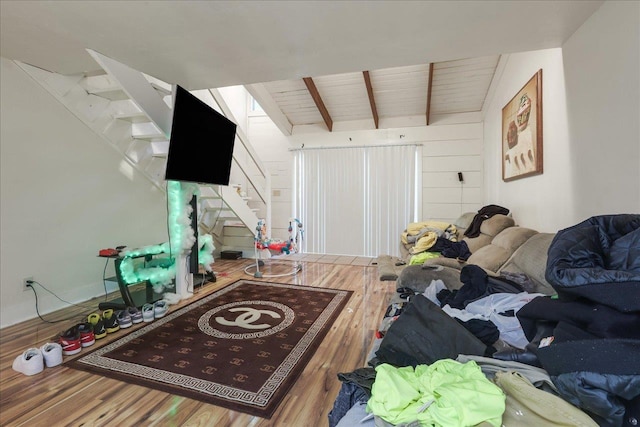 1286 Rumba Ln -, Unit Tallahassee, FL 32304 - living room with stairs, wood finished floors, and beamed ceiling