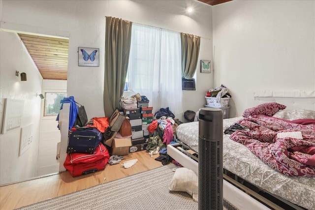 1286 Rumba Ln -, Unit Tallahassee, FL 32304 - bedroom with multiple windows, wood finished floors, and wooden ceiling