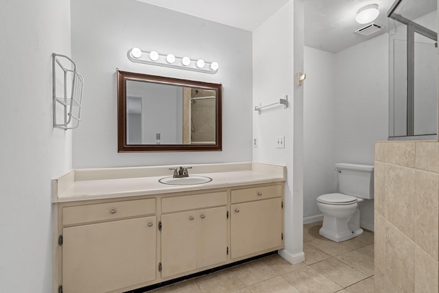 1909 Ermine Ct, Tallahassee, FL 32308 - bathroom featuring vanity, tile patterned floors, and a shower
