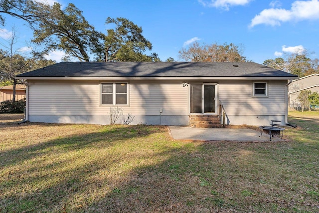 1909 Ermine Ct, Tallahassee, FL 32308 - rear view of property with a patio, a yard, and entry steps