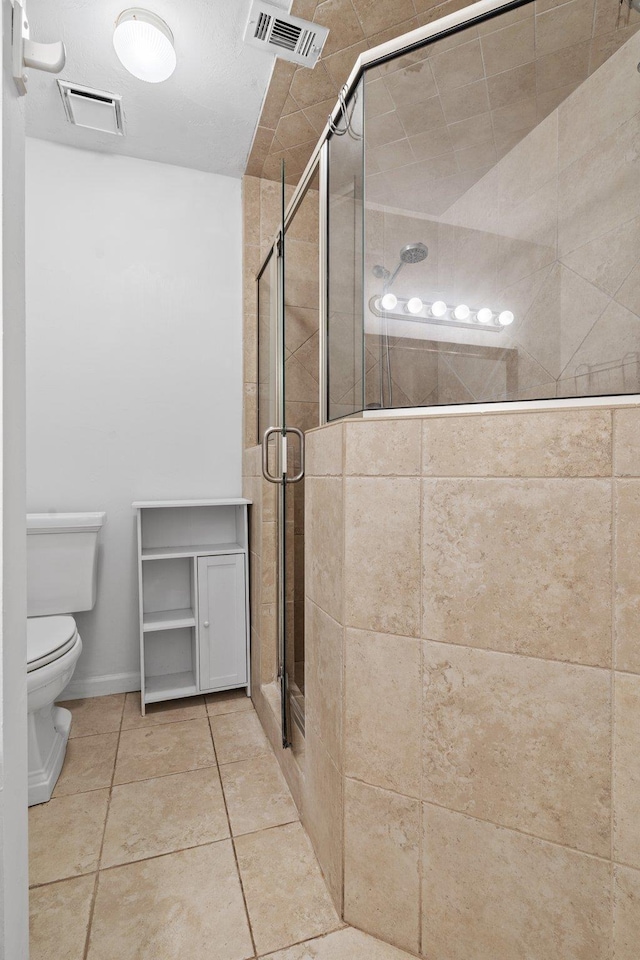 1909 Ermine Ct, Tallahassee, FL 32308 - bathroom with a stall shower and tile patterned flooring