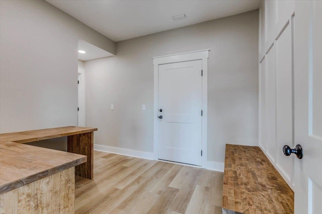 entrance foyer featuring light hardwood / wood-style floors