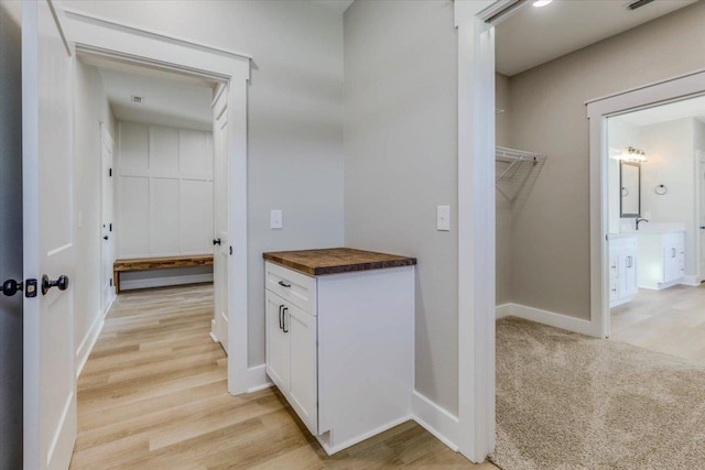 hallway featuring light hardwood / wood-style floors