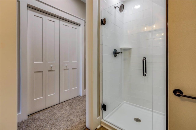 bathroom featuring an enclosed shower