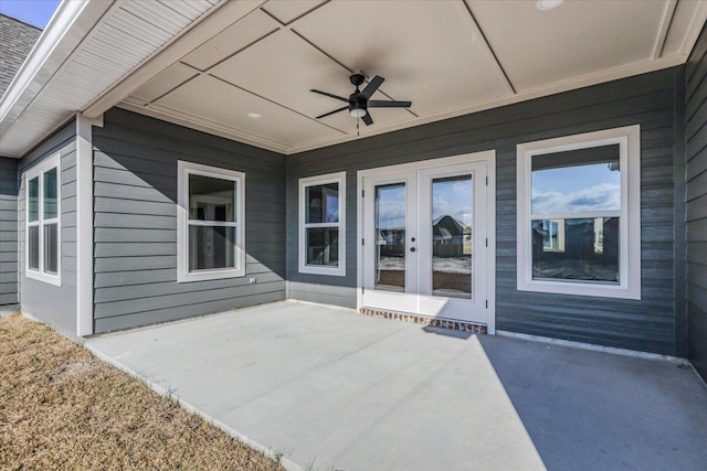 view of patio featuring ceiling fan and french doors