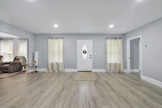 entrance foyer featuring light wood-type flooring