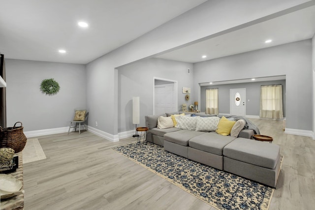 living room with light hardwood / wood-style floors