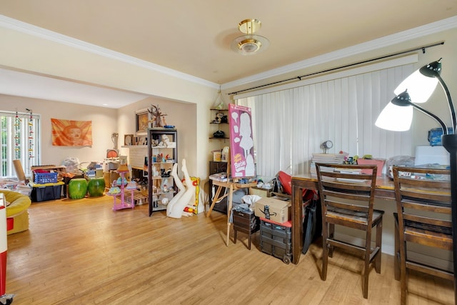 interior space featuring ornamental molding and hardwood / wood-style floors