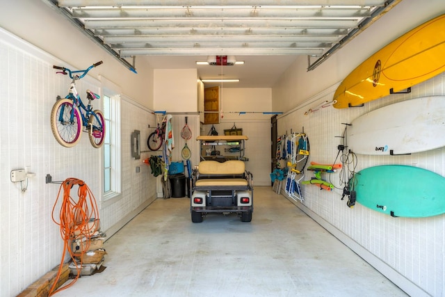 garage featuring a garage door opener