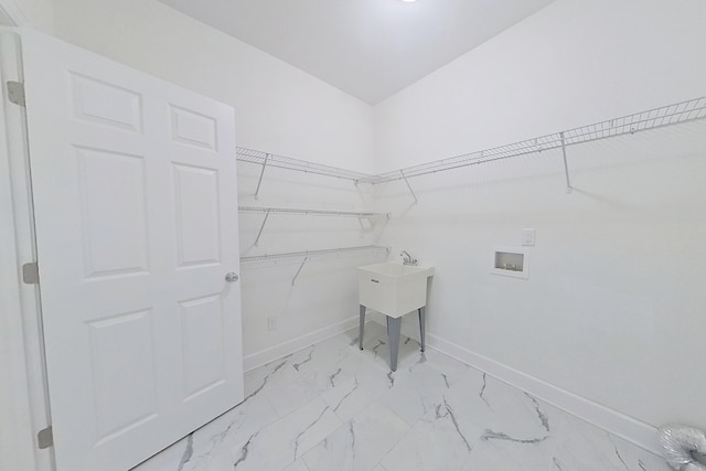 103 Heather Ln, Thomasville, GA 31792 - laundry area featuring baseboards, washer hookup, and light marble finish flooring