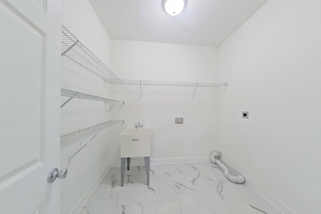 103 Heather Ln, Thomasville, GA 31792 - laundry room featuring hookup for an electric dryer, washer hookup, marble finish floors, and baseboards