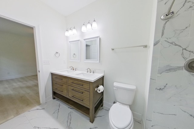 103 Heather Ln, Thomasville, GA 31792 - full bathroom with double vanity, marble finish floors, toilet, and baseboards
