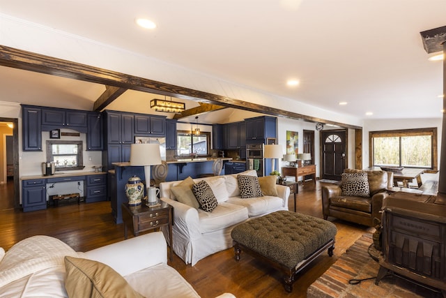 living area with dark wood-style floors, recessed lighting, and lofted ceiling with beams