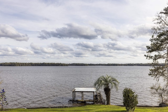 property view of water featuring a boat dock