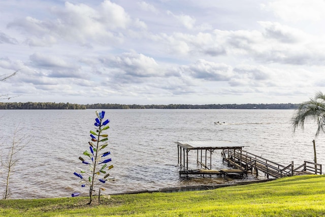 view of dock featuring a water view and boat lift
