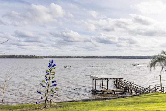 dock area featuring a water view