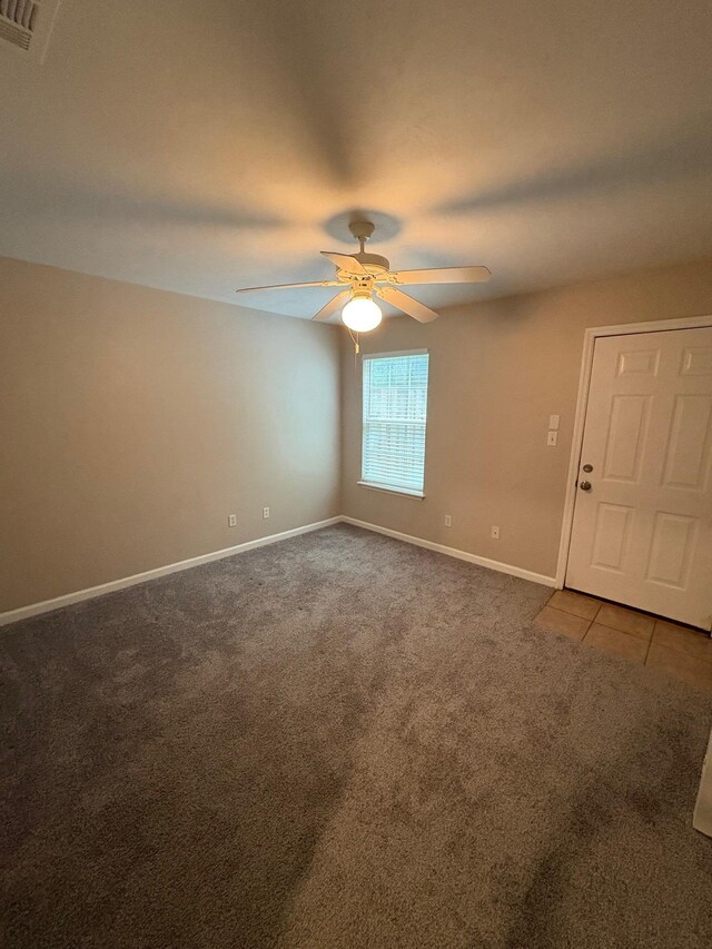 2525 Hartsfield Rd Unit 9, Tallahassee, FL 32303 - carpeted spare room with a ceiling fan and baseboards