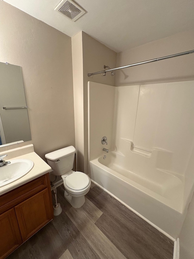2525 Hartsfield Rd Unit 9, Tallahassee, FL 32303 - bathroom featuring wood finished floors, bathing tub / shower combination, and vanity