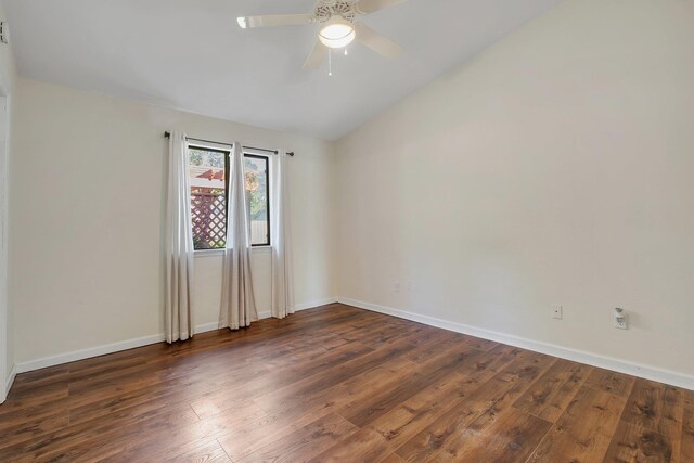3268 Garcia Dr, Tallahassee, FL 32309 - empty room featuring wood finished floors, lofted ceiling, a ceiling fan, and baseboards