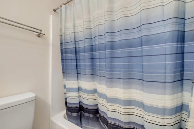 3268 Garcia Dr, Tallahassee, FL 32309 - bathroom with shower / bathtub combination with curtain and toilet