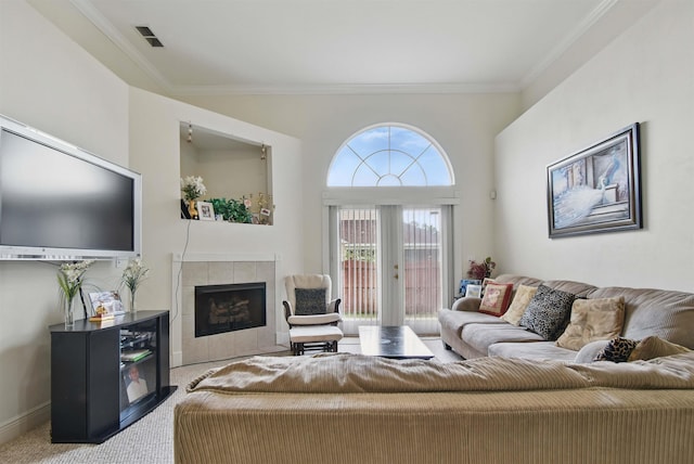 3370 Aqua Ridge Way, Tallahassee, FL 32309 - living area featuring carpet, crown molding, a tiled fireplace, and baseboards