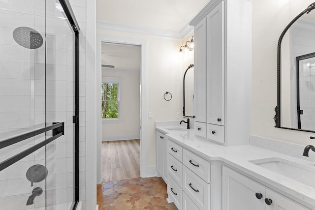 3235 Magazine Cir, Tallahassee, FL 32312 - bathroom featuring crown molding, tiled shower, and double vanity