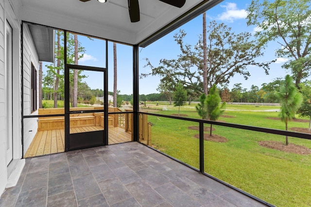 3235 Magazine Cir, Tallahassee, FL 32312 - unfurnished sunroom featuring a ceiling fan