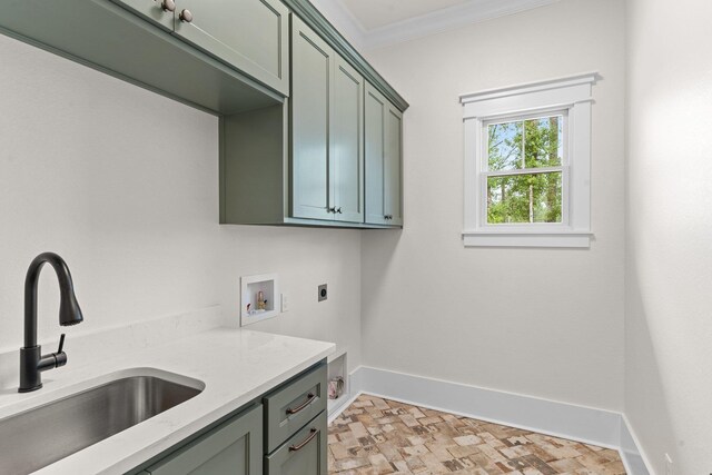 3235 Magazine Cir, Tallahassee, FL 32312 - washroom with cabinet space, electric dryer hookup, washer hookup, baseboards, and ornamental molding