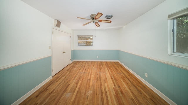 empty room featuring light hardwood / wood-style floors and ceiling fan