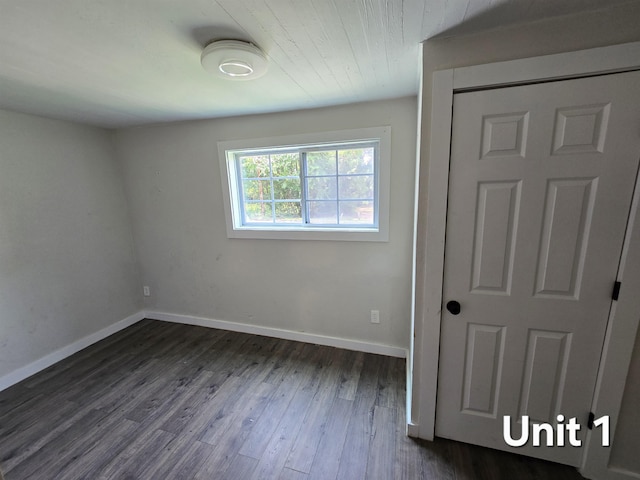 208 Putnam Dr Unit 1, 2, 3, Tallahassee, FL 32301 - unfurnished bedroom featuring dark wood-type flooring and wood ceiling