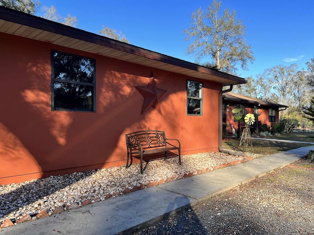 376 Tecumseh Rd, Monticello, FL 32344 - view of side of home with stucco siding