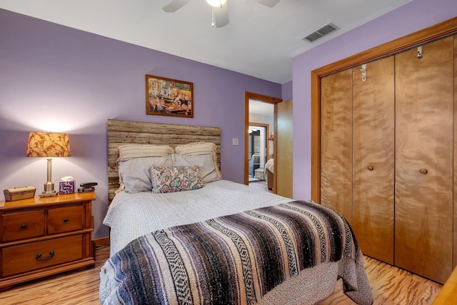 bedroom featuring ceiling fan, a closet, and light hardwood / wood-style flooring