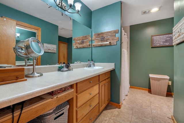 bathroom featuring vanity and tile patterned flooring