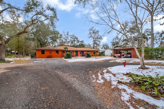 view of front of house featuring a carport