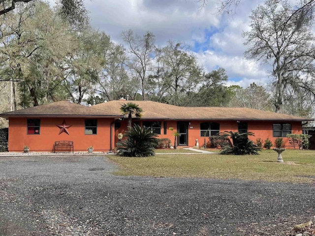 376 Tecumseh Rd, Monticello, FL 32344 - ranch-style house with a front lawn