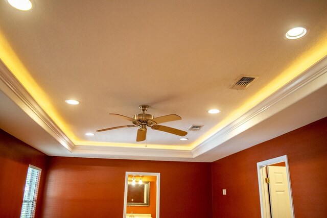 21 Blenheim Rd Fl, Shalimar, FL 32579 - room details featuring ceiling fan, crown molding, and a tray ceiling