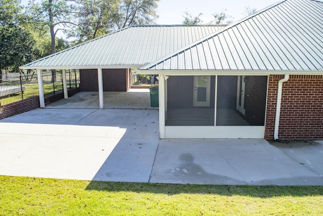 21 Blenheim Rd Fl, Shalimar, FL 32579 - exterior space featuring a yard, a carport, and a sunroom