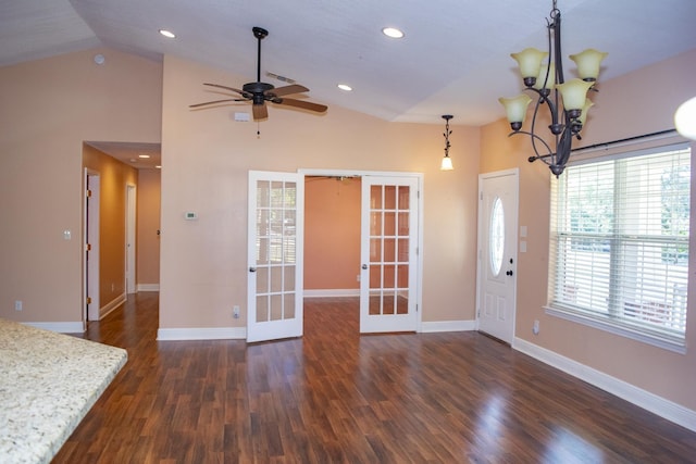 21 Blenheim Rd Fl, Shalimar, FL 32579 - unfurnished living room featuring french doors, ceiling fan with notable chandelier, dark hardwood / wood-style floors, and vaulted ceiling